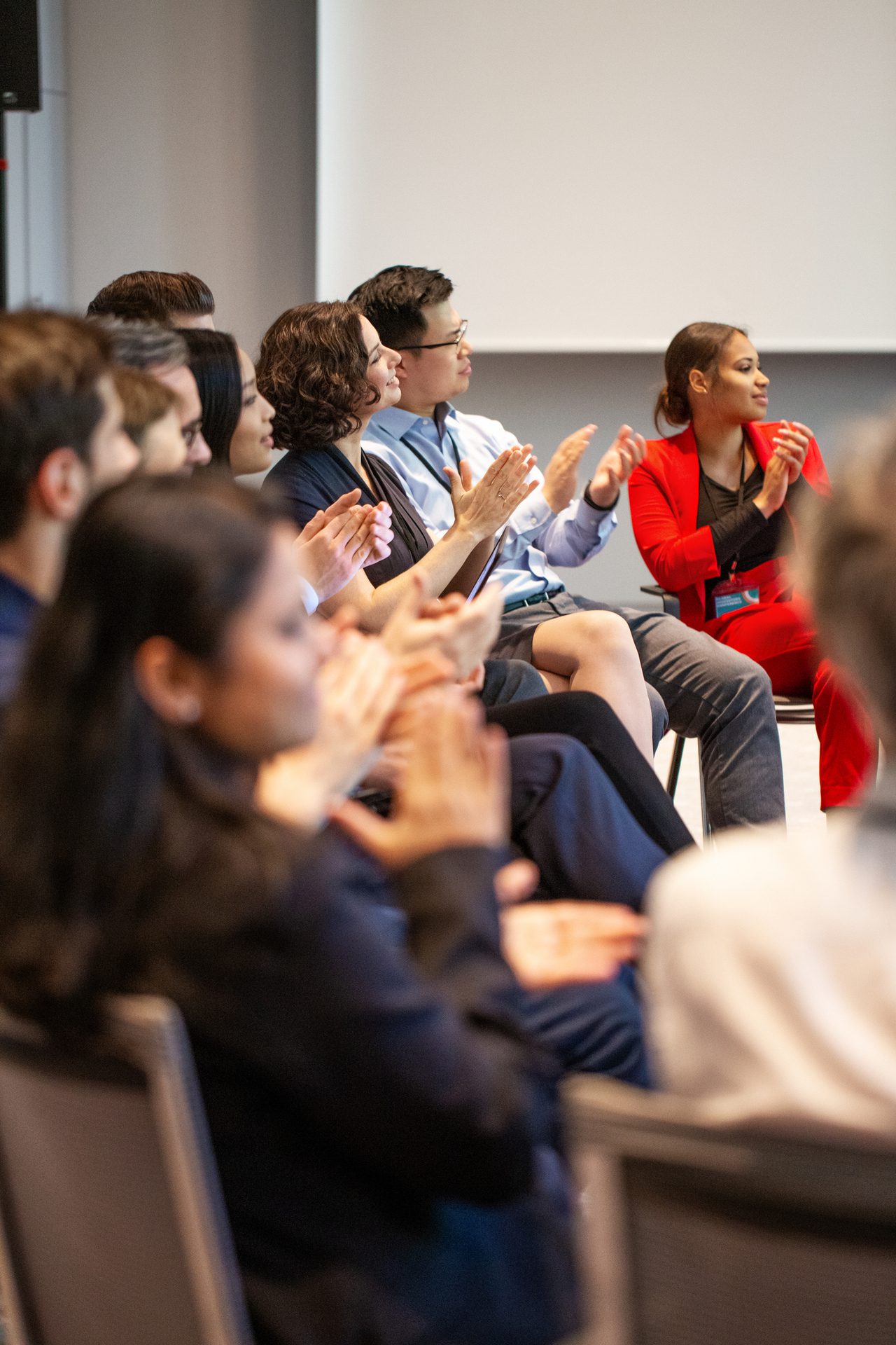 Group of people listening to a speaking engagement